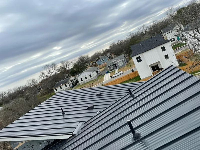 Standing seam metal roof panels with vents for Skylight Repair in Blackhawk